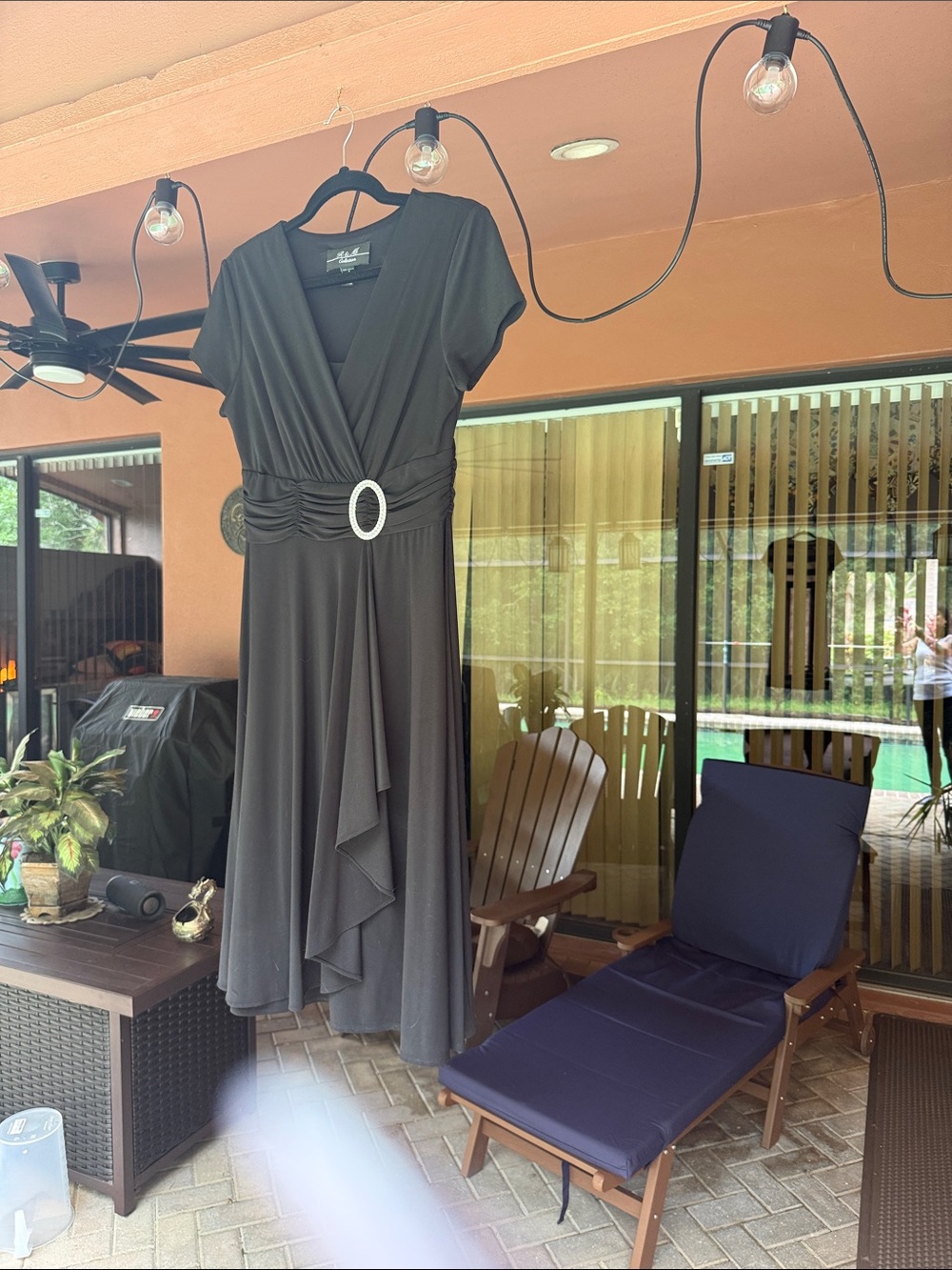 Elegant Black Wrap Dress with Decorative Buckle. Size 8